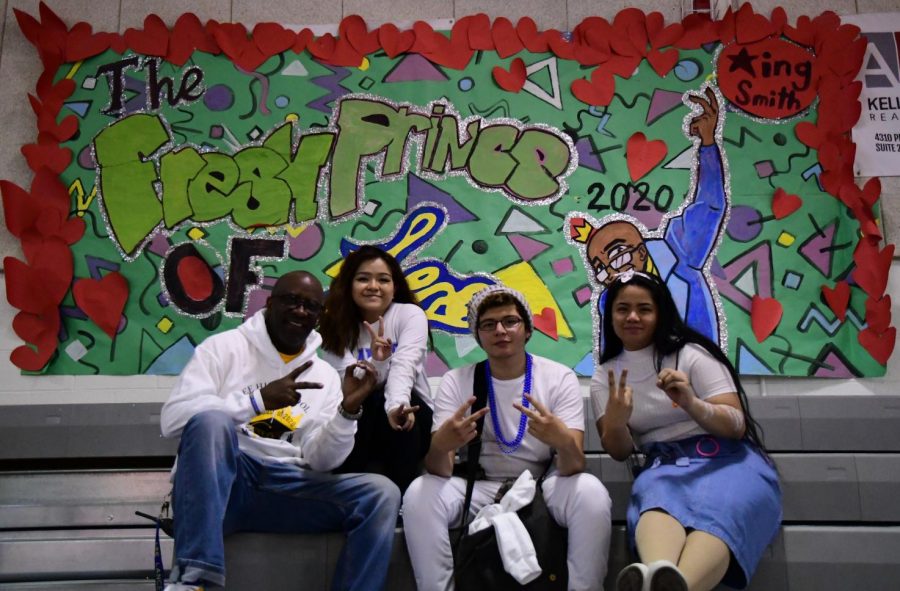 A nod to Mr. Smith: Seniors Deena Boonum, Arnoldo Herrera, and Sandra Flores gather with principal Alfonso Smith under a witty, celebratory banner.