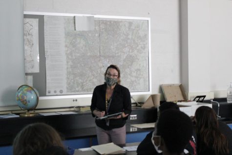 End of an era: Geosystems and Geospatial Analysis teacher Mary Schaefer addresses her students as she ends her final year of teaching at Lewis.