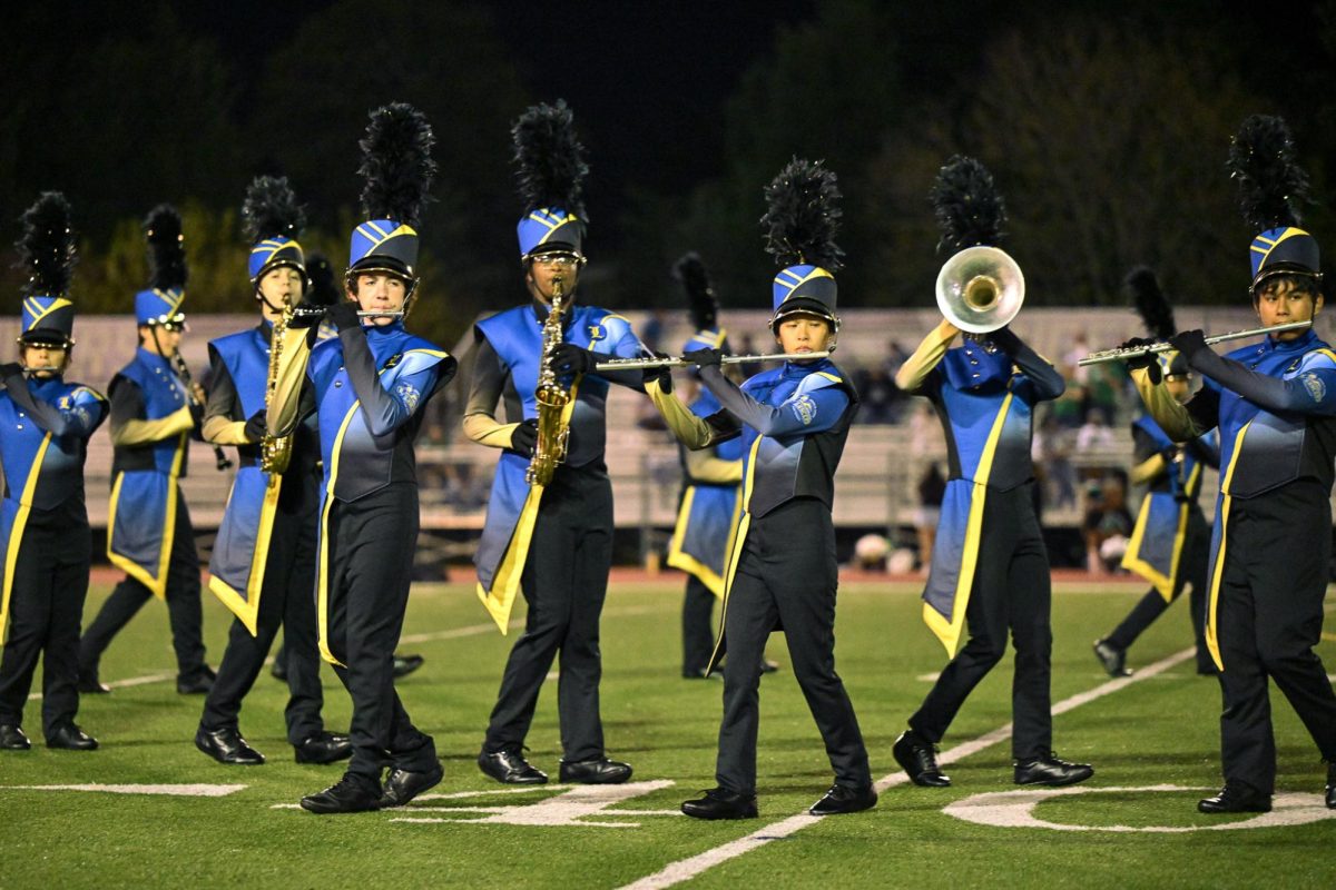 Lewis Lancers Marching Band performs at halftime during the September 12 home game against Wakefield.