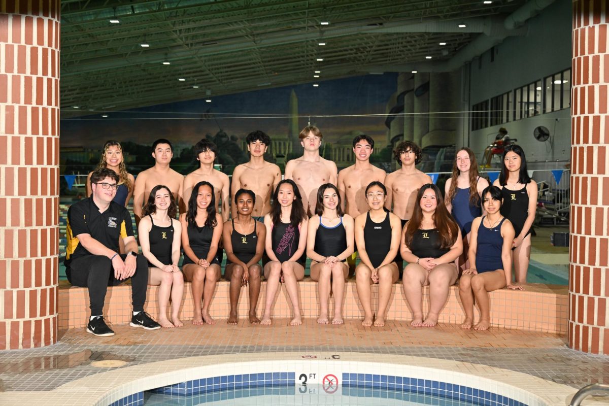 The 2025-2026 Lewis swim team, led by Coach Vincent Cervone, supports one another and celebrates the team's individual accomplishments.